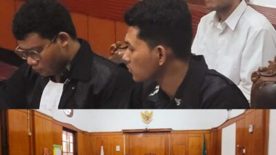 Foto menjalani sidang di ruang Candra PN Surabaya
