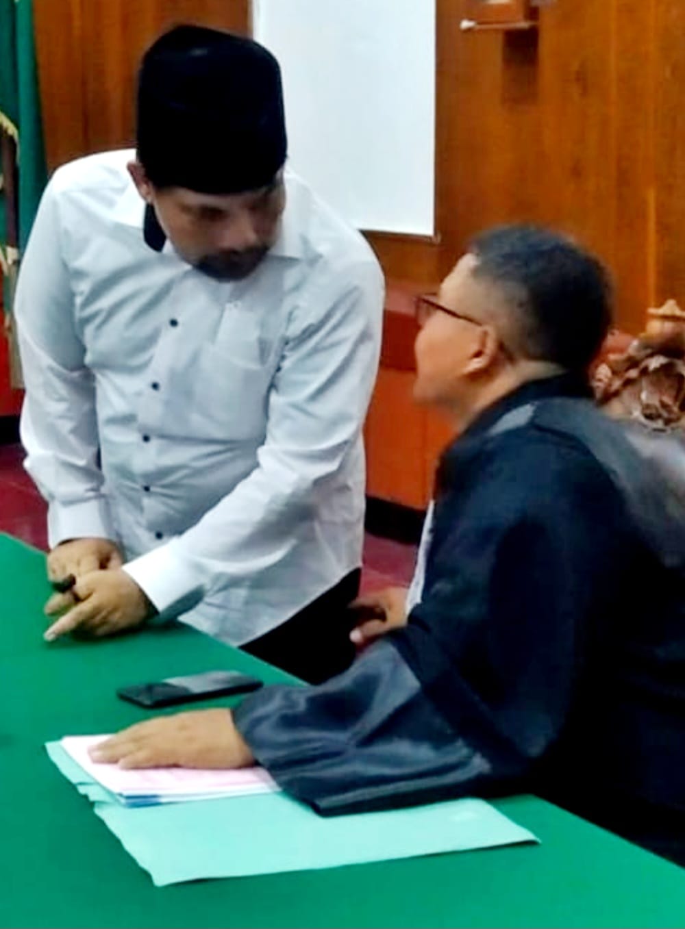 Foto agenda menjalani sidang pembacaan dakwaan